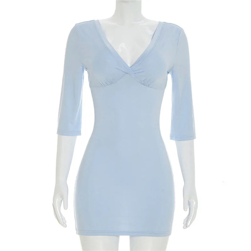 Light blue dress on a mannequin against a white background