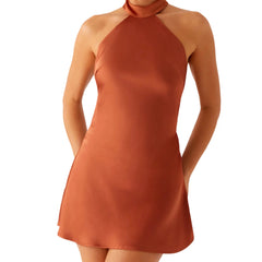 Orange halter neck dress on a white background