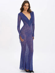 Elegant blue animal-print maxi dress shown in a refined silhouette
