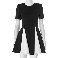 Black and white dress on a mannequin against a white background