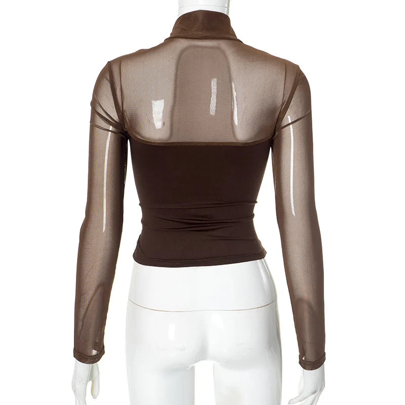 Brown long-sleeve top with sheer mesh panels on a mannequin against a white background