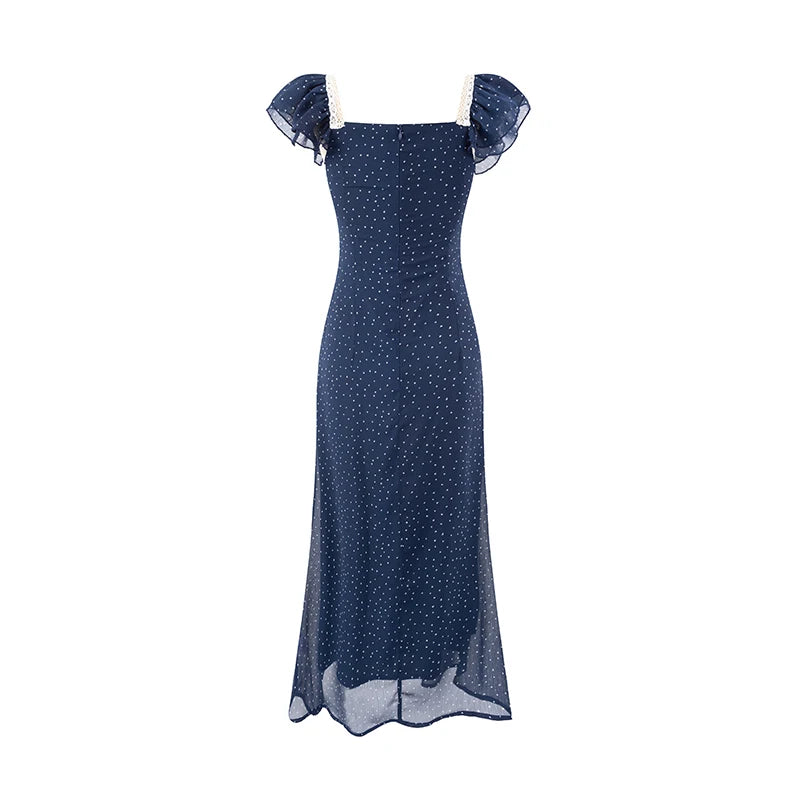 Back view of a blue polka dot midi dress with a square neckline and ruffled sleeves.