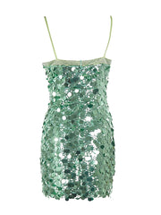 Green sequin dress with thin straps on a white background