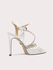 White high-heeled shoe with lace details on a light pink background