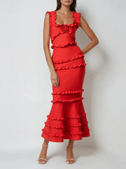 Red ruffled dress on a white background