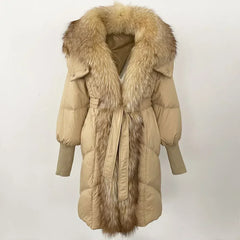 Beige puffer coat with fur trim on a white background