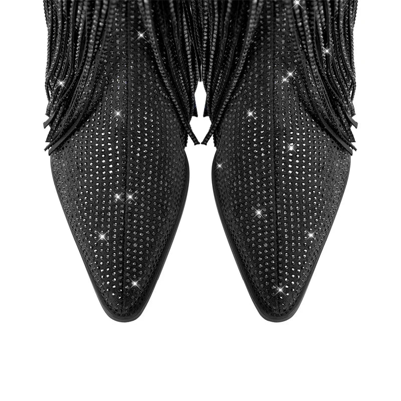 Black studded high-heeled shoes on a white background