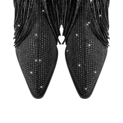 Black studded high-heeled shoes on a white background