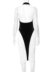 Mannequin wearing a black and white dress with a unique design