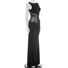 Black evening gown on a mannequin against a white background