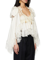 Close-up of Lace V-Neck Lace-Up Blouse Detail