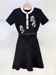 Round neck mini dress with refined textured detailing