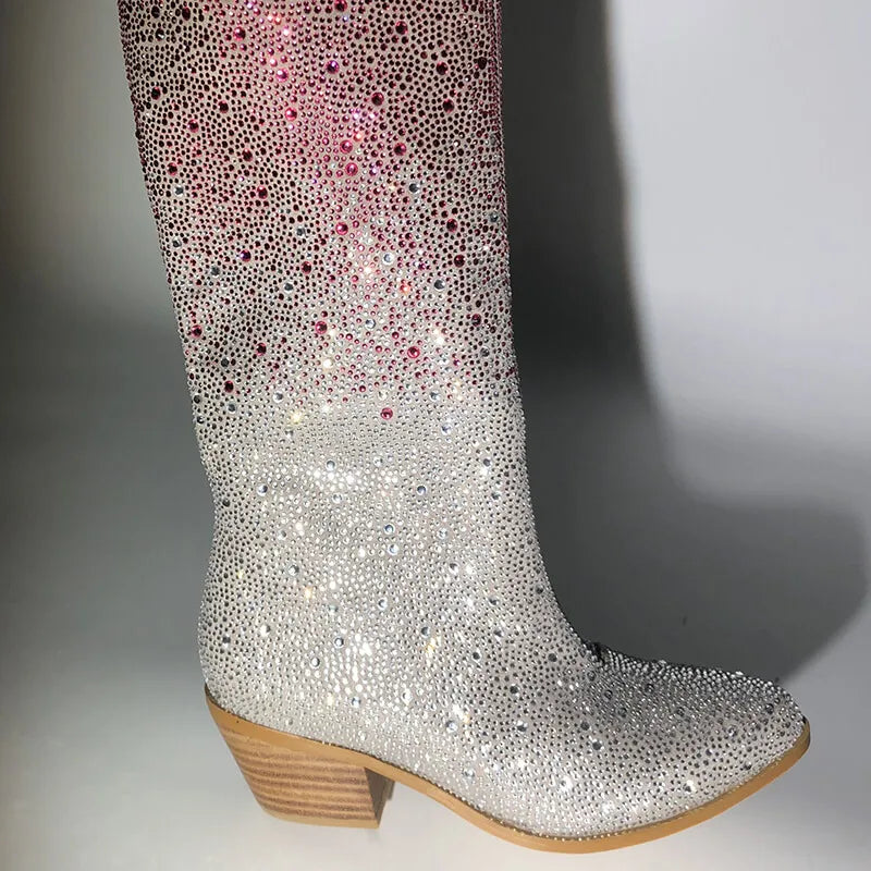 Silver embellished boot on a gray background