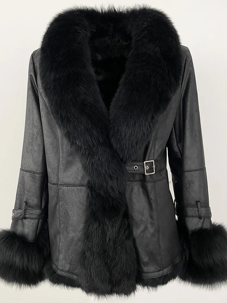 Black shearling coat with a black fox fur collar and matching cuffs.