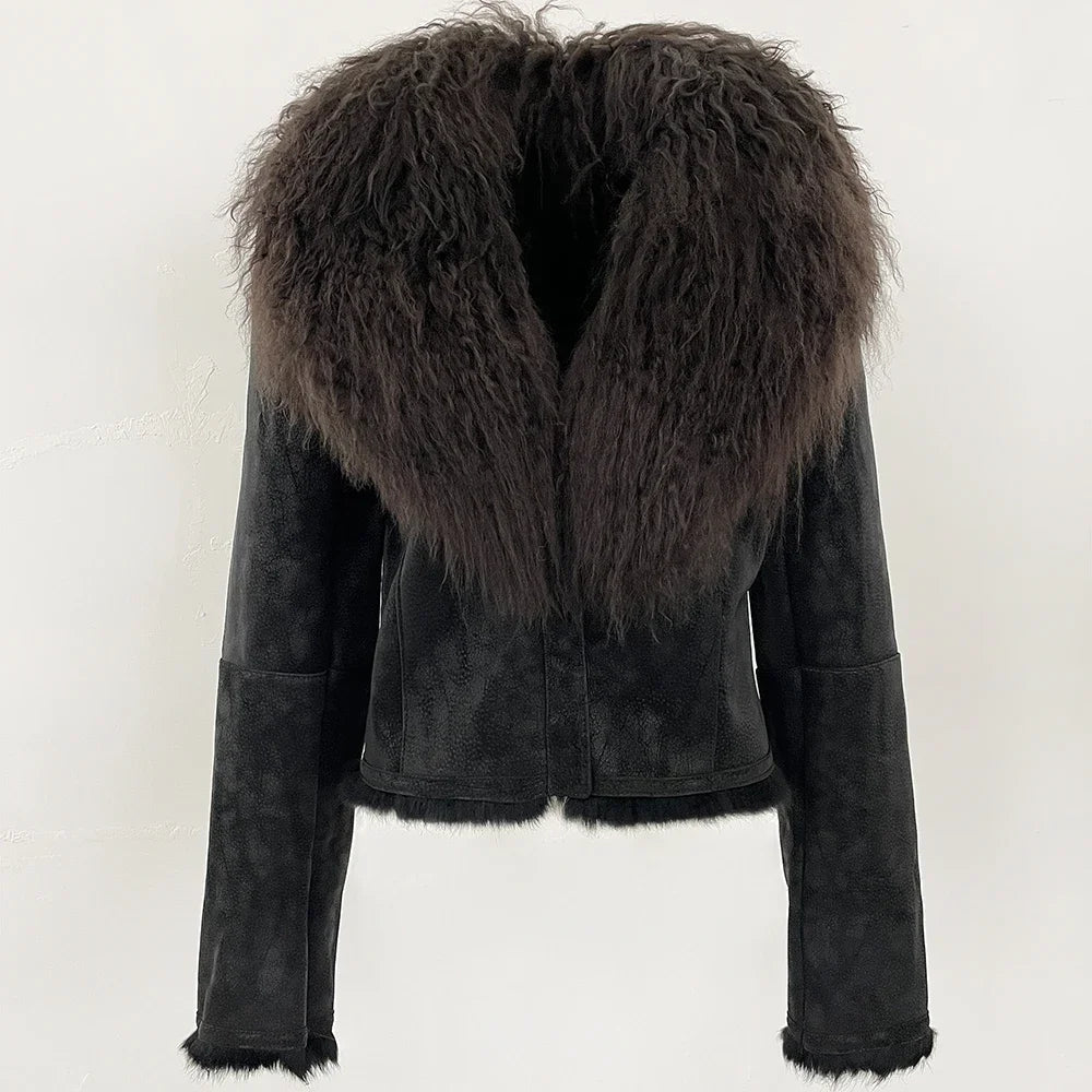 Black suede jacket with fur collar on a white background