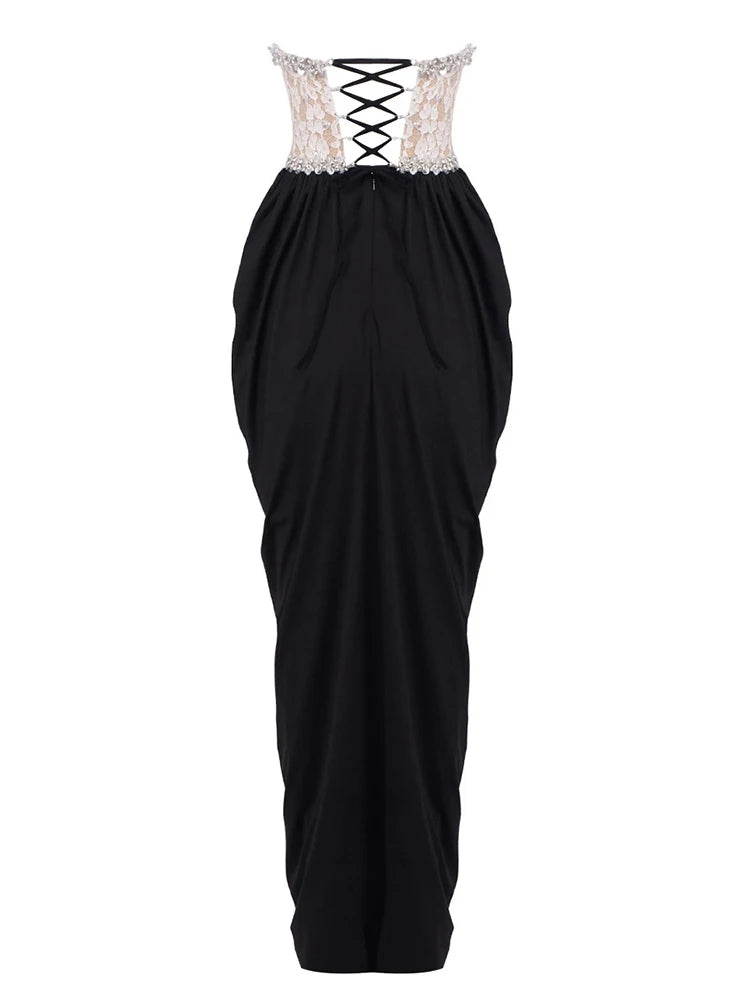 Black dress with lace-up back on a white background