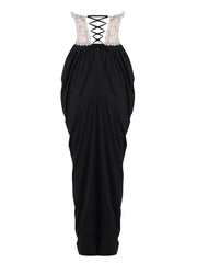 Black dress with lace-up back on a white background