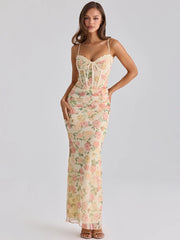 Floral print mesh corset maxi dress on a model