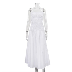 White dress on a mannequin against a white background