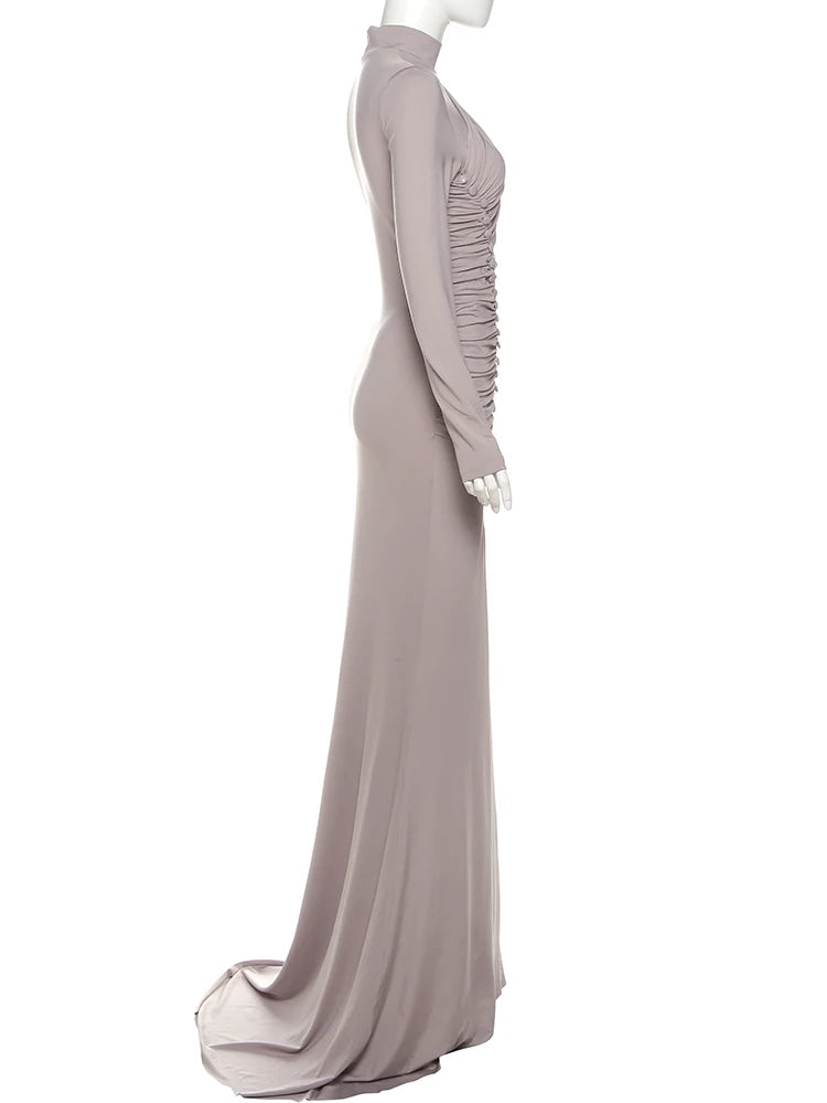 Long, light gray dress on a mannequin against a white background