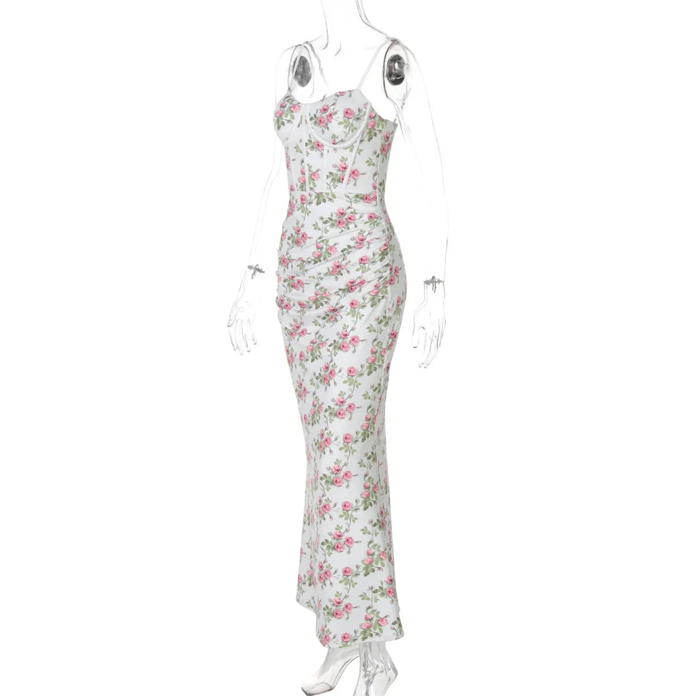 Floral dress on a mannequin against a white background