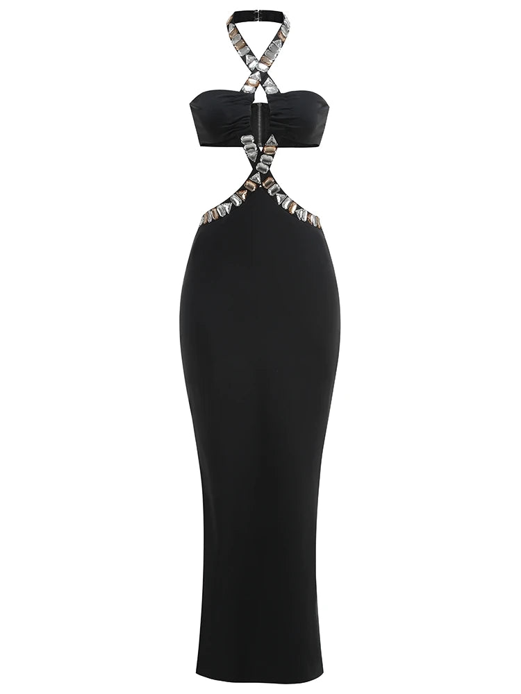 Black halter neck dress with silver embellishments on a white background