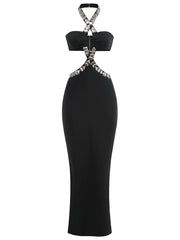 Black halter neck dress with silver embellishments on a white background