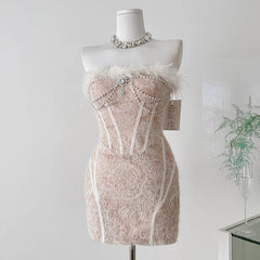 Feather trimmed pearl embellished corset mini dress front view
