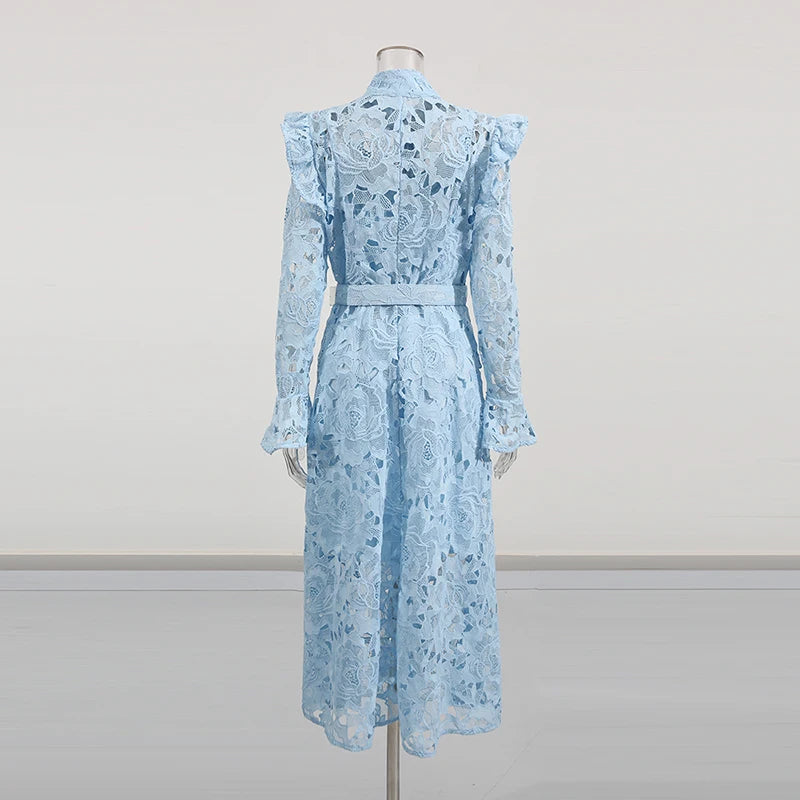 Light blue lace dress on a mannequin against a plain background