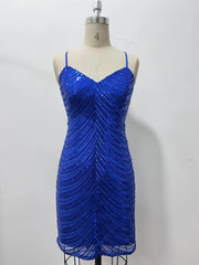 Blue sequin dress on a mannequin against a white background