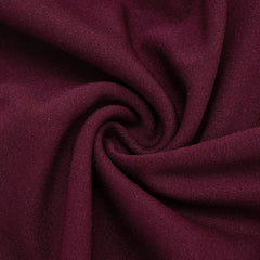 Close-up of dark purple fabric with folds
