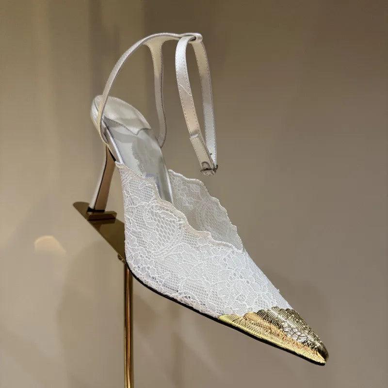 White lace pointed toe stiletto heel with ankle strap and gold toe cap