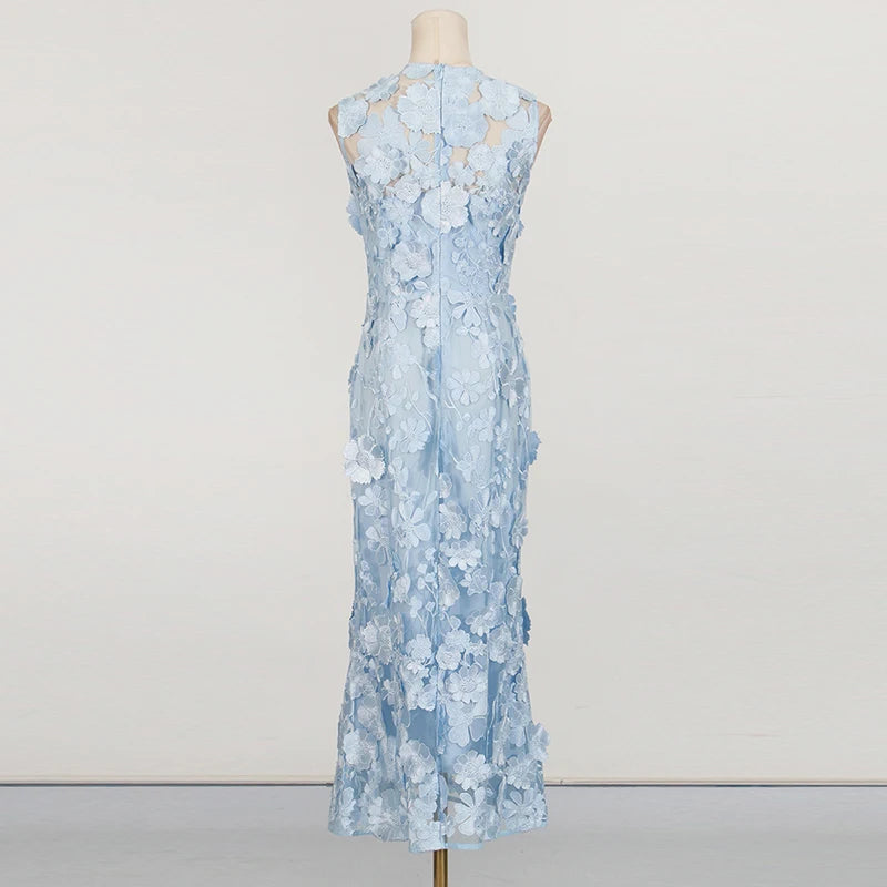 Light blue floral dress on a mannequin against a white background