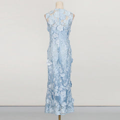 Light blue floral dress on a mannequin against a white background