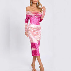 Woman wearing a pink and purple gradient dress