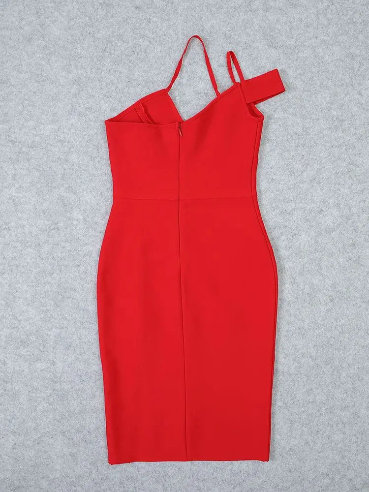 Red dress with thin straps on a gray background