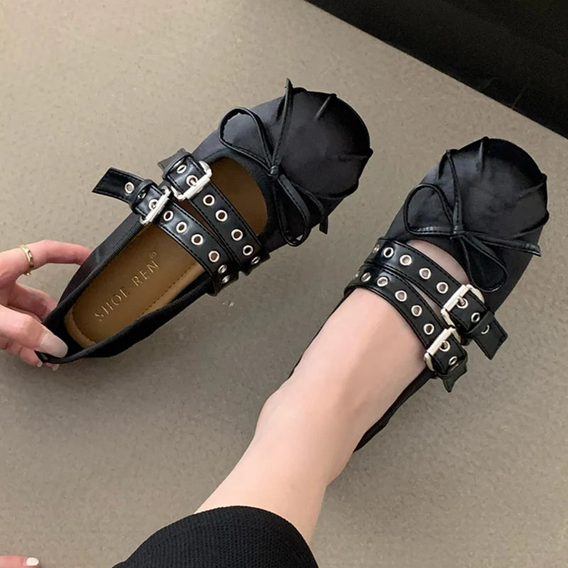 Black silk ballet flats with double buckle straps and butterfly knot