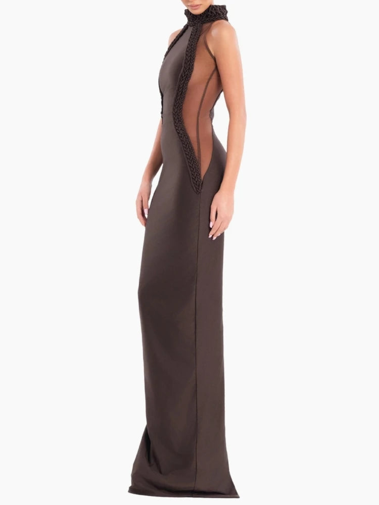 Brown evening gown with sheer back on a white background