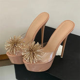 Nude platform stiletto mules with clear PVC and gold rhinestone embellishments