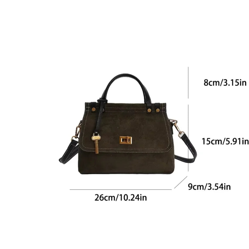 Brown handbag with measurements on a white background