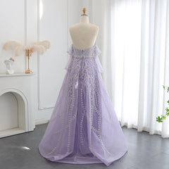 Lavender evening gown on a mannequin against a white curtain backdrop