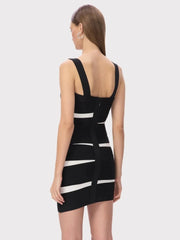 Black and white dress with geometric pattern on a plain background