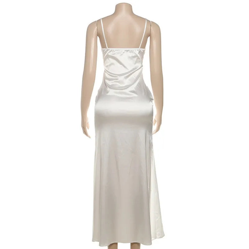 White satin dress on a mannequin against a white background