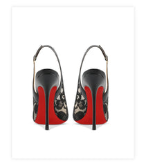 Black high-heeled shoes with red soles and floral patterns on a white background