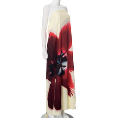 Mannequin wearing a strapless dress with floral design on a white background