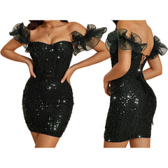 Black sequin dress with sheer sleeves on a white background