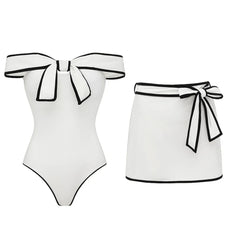 White off-the-shoulder swimsuit and wrap skirt set with contrast trim