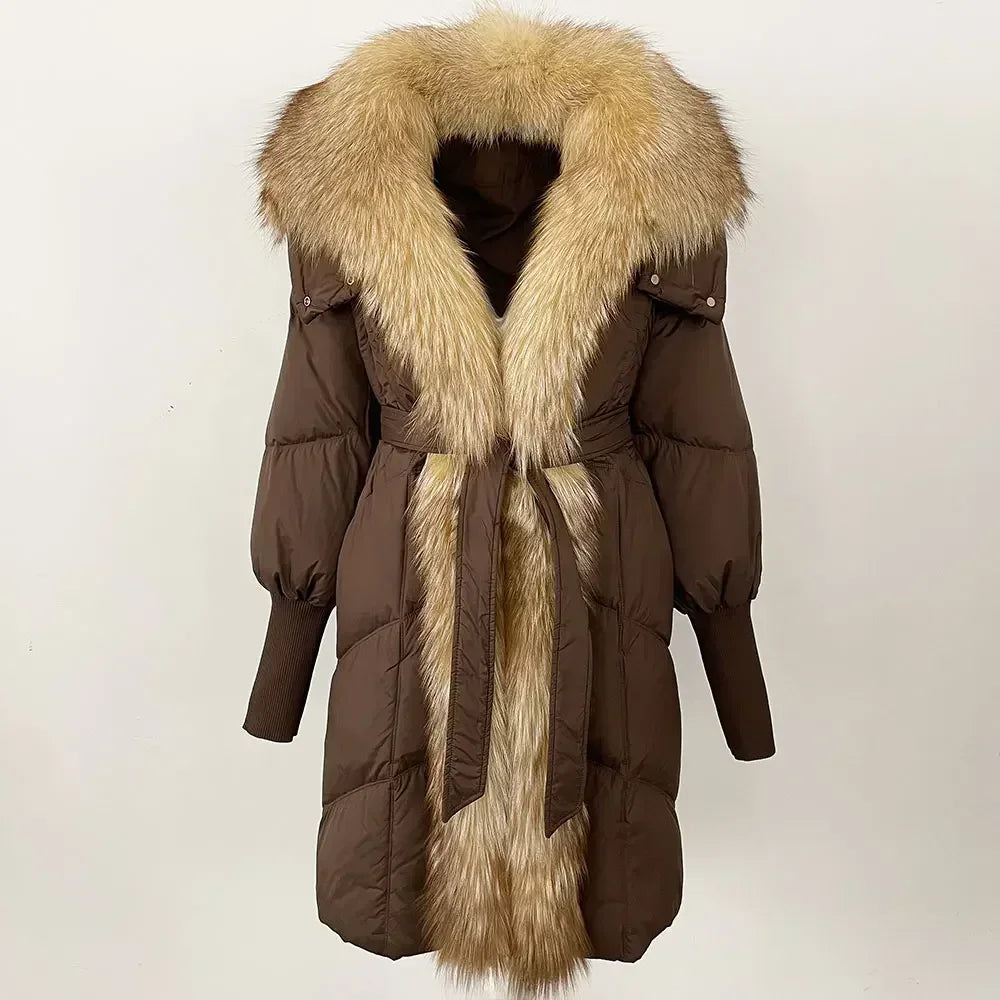Brown winter coat with fur trim on a light background
