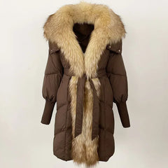 Brown winter coat with fur trim on a light background