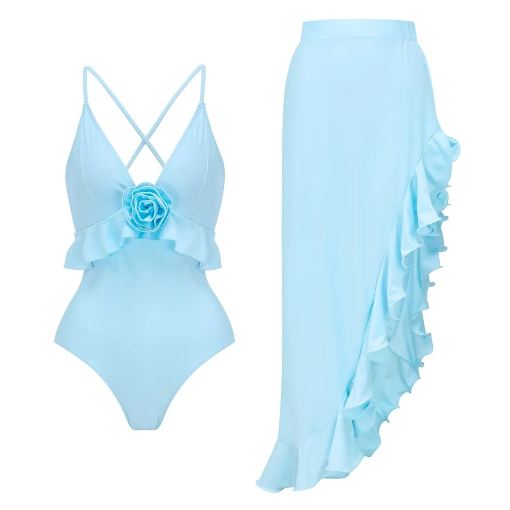Ruffled one-piece swimsuit with floral detail and matching flowy maxi skirt